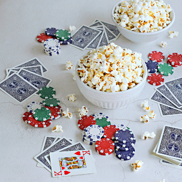Dell Cove Spices popcorn in a white popcorn bowl as snack food for poker game night