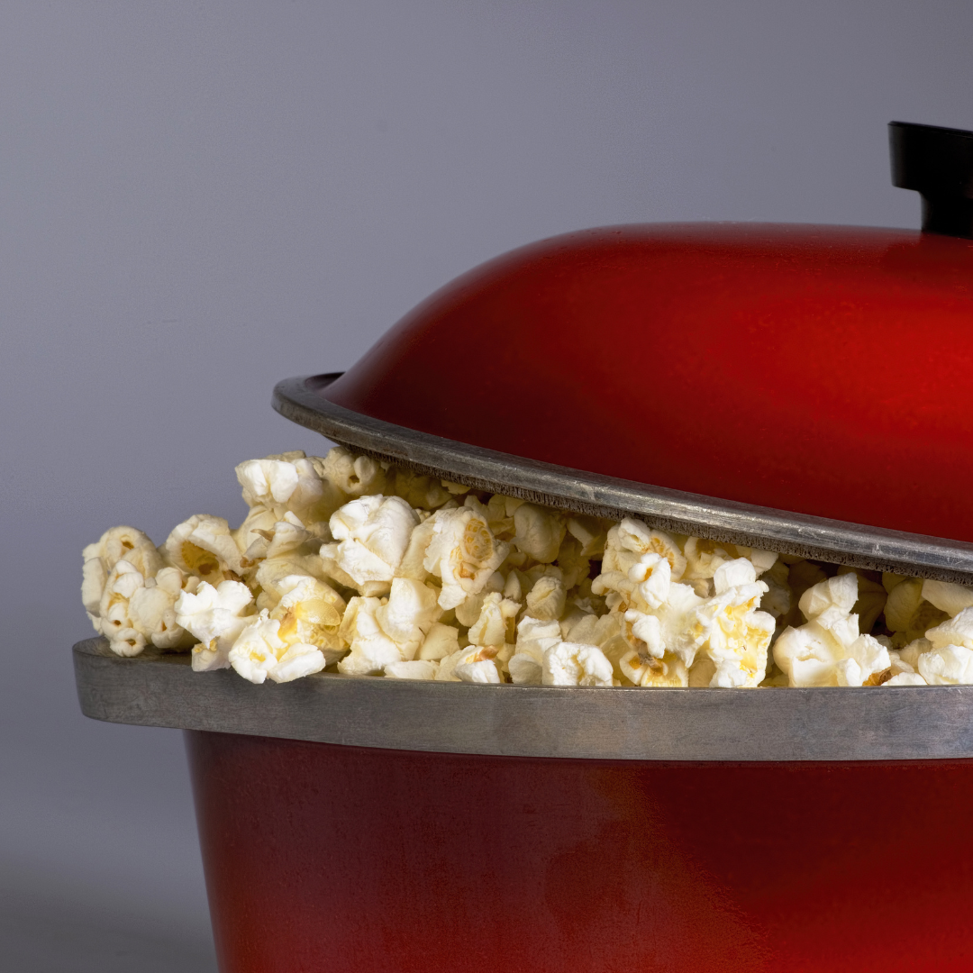 Popped popcorn in a red pot