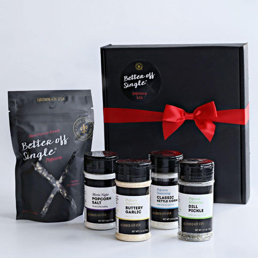 Better Off Single® Popcorn Kit self-care gift box with black popcorn kernels and gourmet seasonings