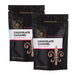 Two pouches of Dell Cove Chocolate Caramel Popcorn Seasoning, half-pound bundle.