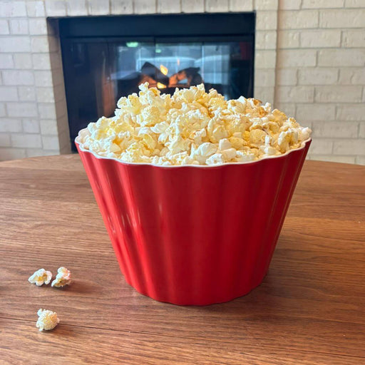 Crate & Barrel red melamine popcorn tub filled with popcorn