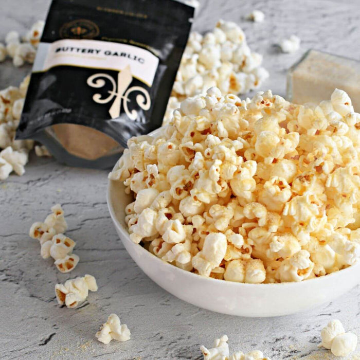 Bowl of buttery popcorn with roasted garlic seasoning for gourmet movie night snacks
