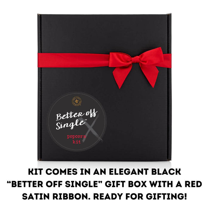 Funny breakup care-package gift — Dell Cove Better Off Single® Popcorn Kit in sleek black box with red ribbon.