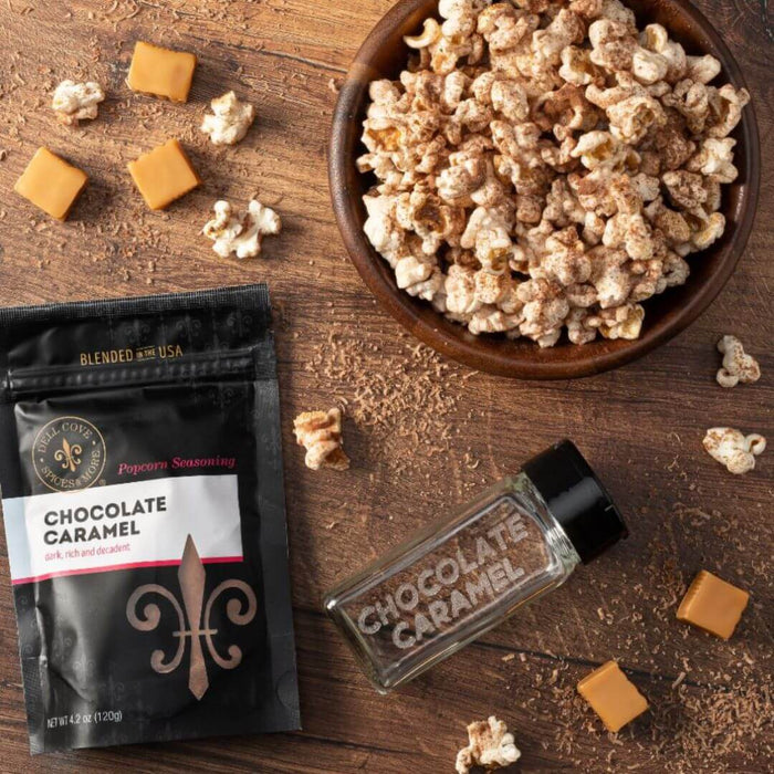 Chocolate caramel drizzle on freshly popped popcorn using Dell Cove® Chocolate Caramel Popcorn Seasoning