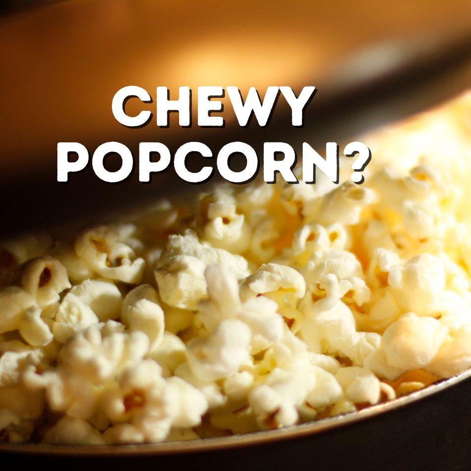 Bronze pan filled with popped popcorn showing how to fix chewy popcorn for a crunchy snack