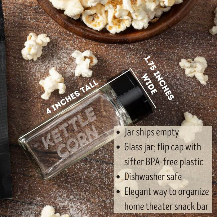 Glass jar used for storing Kettle Corn popcorn seasoning with popped popcorn on a wooden surface