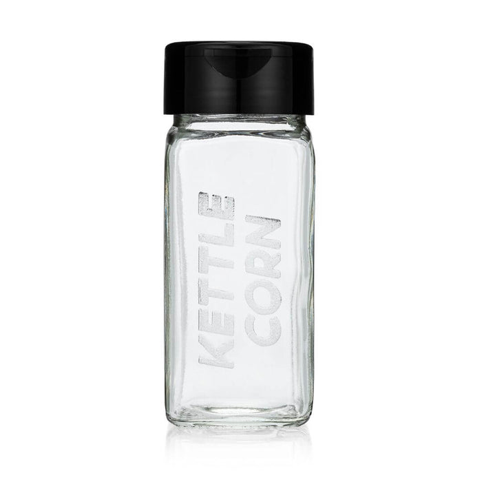 Clear glass spice bottle for storing Kettle Corn popcorn seasoning
