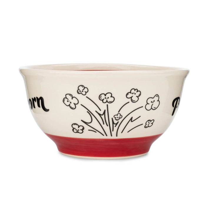 Side view of Dell Cove® handmade ceramic popcorn bowl with black popcorn artwork.