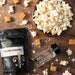 Dell Cove Salted Caramel popcorn seasoning with popped popcorn and caramel pieces – gluten-free sweet snack