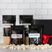Dell Cove® Spicy Popcorn Seasoning Gift Set – four gourmet spicy popcorn flavors in black gift box, perfect for movie night
