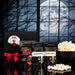 Scary Movie Vampire Popcorn Gift Kit with Bloody Red popcorn kernels, two gourmet popcorn seasonings and a black gift box with red satin ribbon, beside a bowl of popcorn.