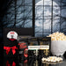 Scary Movie Vampire Halloween popcorn gift kit with Bloody Red popcorn kernels, two gourmet seasonings, black gift box with red ribbon and white skeleton-shaped microwave popcorn popper.