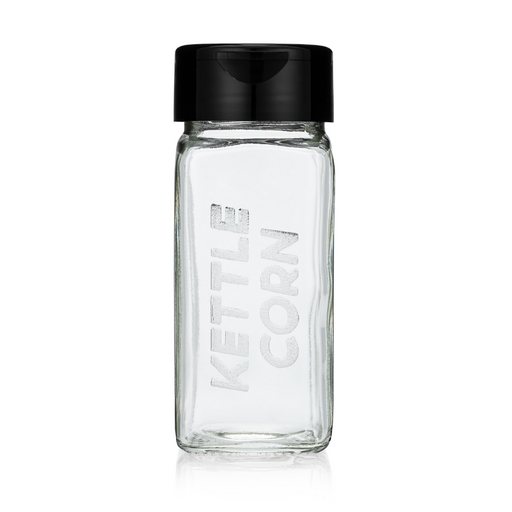 empty glass spice jar with black flip cap and popcorn seasoning flavor kettle corn etched on one side - dell cove spices