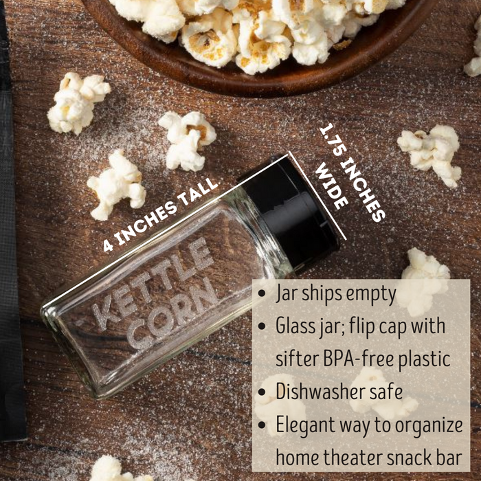 empty glass spice jar with black flip cap and popcorn seasoning flavor kettle corn etched on one side and with a bowl of flavored popcorn  - dell cove spices