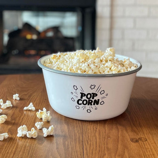 Large white enamel popcorn bowl with gray rim and black Dell Cove popcorn artwork
