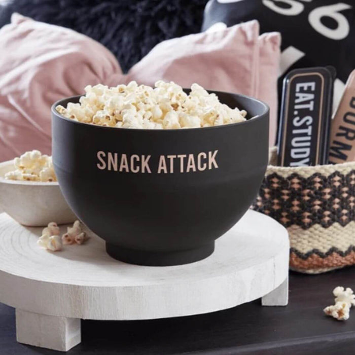 Black silicone microwave popcorn popper filled with fresh popcorn for a game day snack