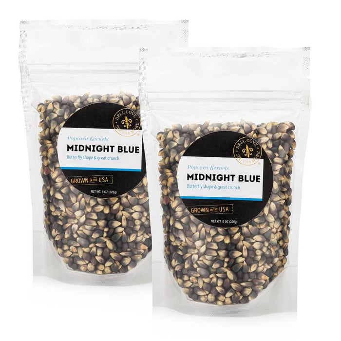 Two half-pound pouches of Dell Cove Midnight Blue popcorn kernels, sold together as the 1-pound option