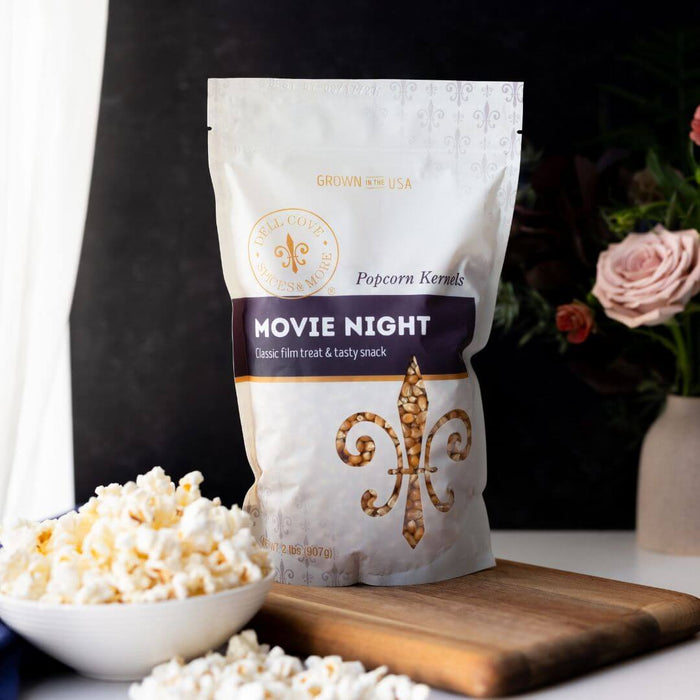 Dell Cove Movie Night yellow butterfly popcorn kernels with a bowl of popped popcorn