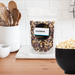Rainbow popcorn kernels pouch in a kitchen with a popcorn popper - dell cove spices