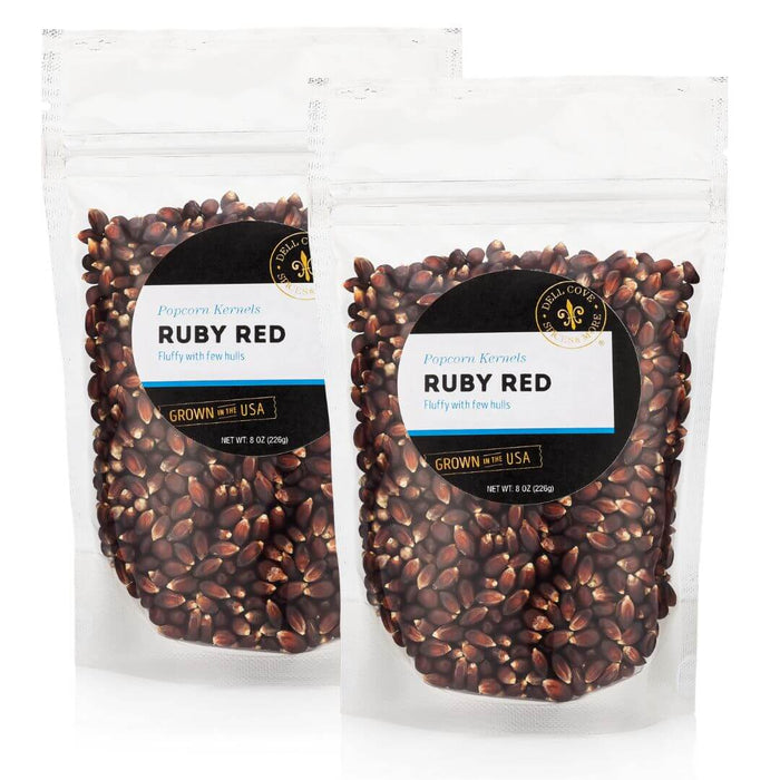 Two half-pound pouches of Dell Cove Ruby Red popcorn kernels, sold together as the 1-pound option