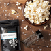 Salt and Vinegar popcorn seasoning pouch with bowl of popcorn and empty spice jar - dell cove spices