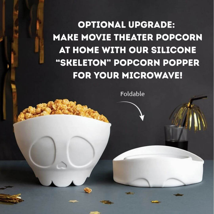Optional white skeleton-shaped silicone microwave popcorn popper shown filled with popcorn and folded flat for storage.